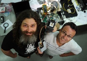 Institute for Quantum Computing scientists Vadim Makarov (left) and Thomas Jennewein are part of an international team of researchers who made a major breakthrough in quantum teleporting.