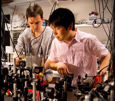 Photo of physicists working on the teleportation experiment at the Quantum Optics Lab at the Niels Bohr Institute